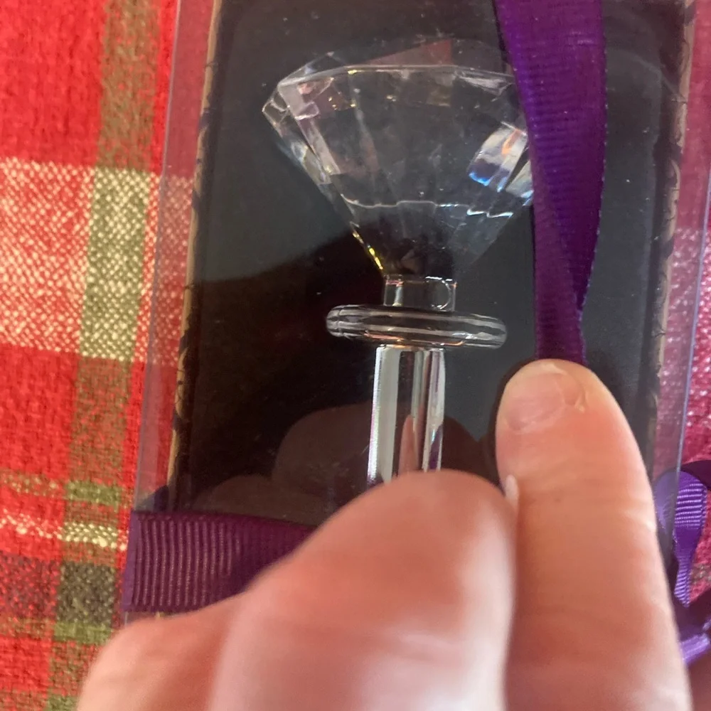 Faux diamond bottle opener. New in box. Super cute & Would make a great gift